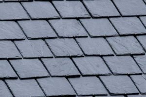 New slate roof, slate texture, perfect shape. Slating roof. Grey colors.